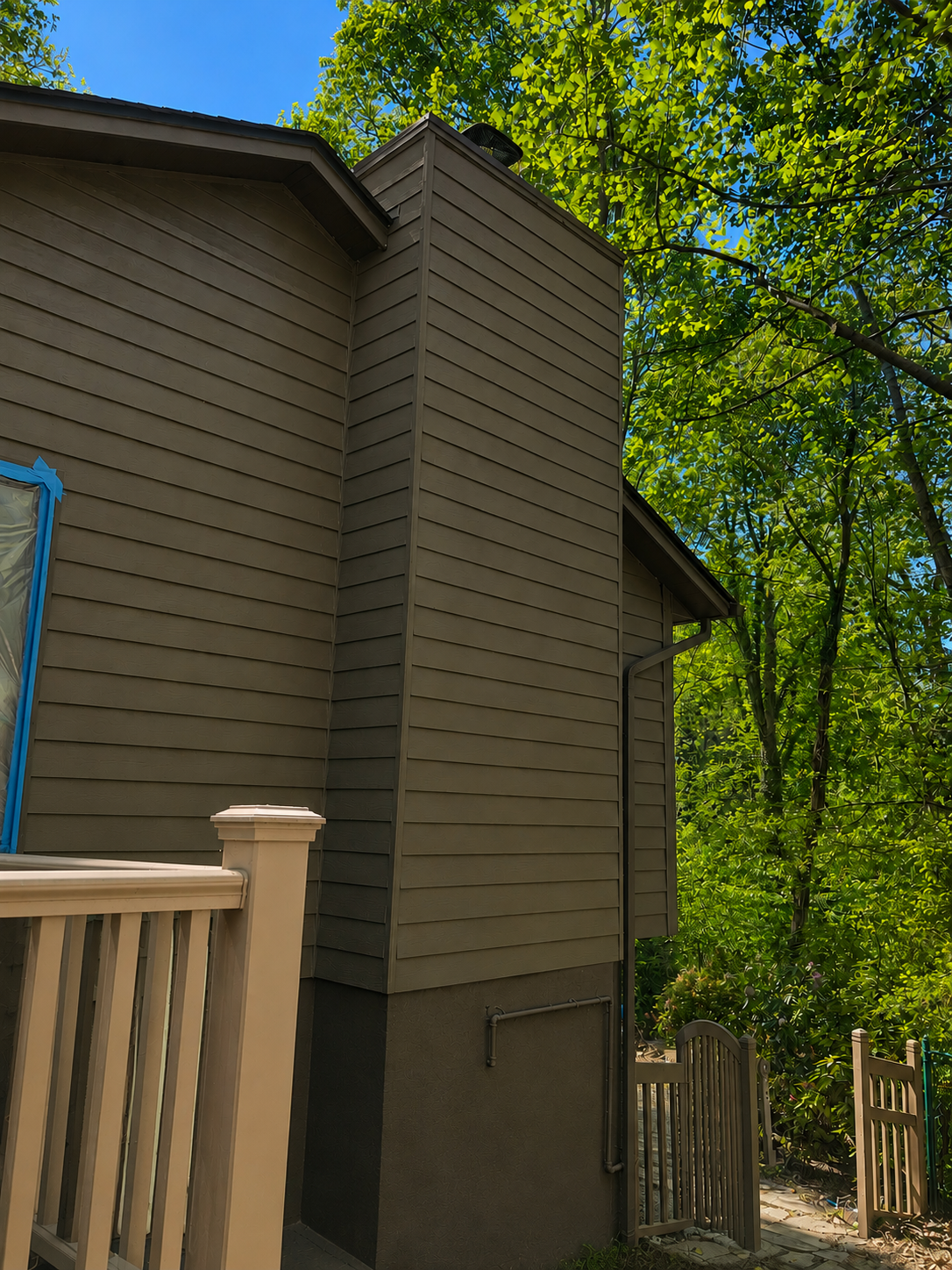Finished siding and roofing project by Oak and Holly Renovations in Asheville, NC